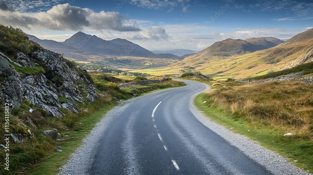 Fototapeta premium Scenic mountain road winding through lush green valley under vibrant blue sky with clouds : Generative AI