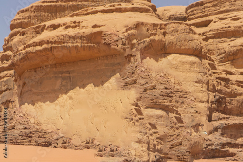 Jordan, Wadi Rum desert. Incredible landscapes with vibrant colors on all sides. Martian city surrounded by incredible rocks and mountains of bizarre shapes with most unusual architecture..