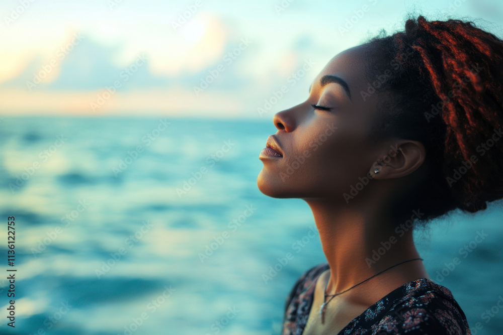 Woman praying by the sea under a blue sky spiritual reflection coastal serenity peaceful environment side view embracing nature Woman praying by the sea under a blue sky spiritual reflection coastal serenity peaceful environment side view embracing nature
