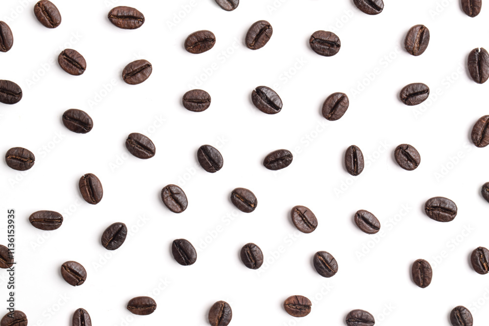 Fototapeta premium Coffee beans pattern isolated on white background. Top view
