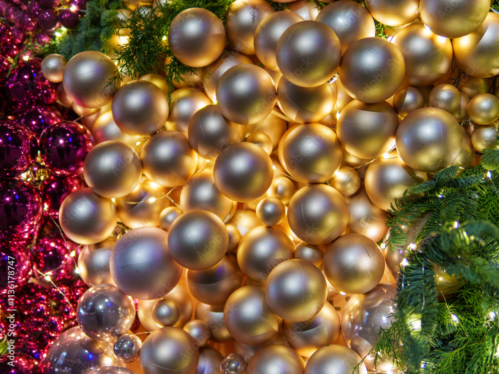 A vibrant display of golden ornaments illuminated by soft lights creates a festive atmosphere. The arrangement showcases a variety of sizes, enhancing the holiday spirit and joy. A vibrant display of golden ornaments illuminated by soft lights creates a festive atmosphere. The arrangement showcases a variety of sizes, enhancing the holiday spirit and joy.