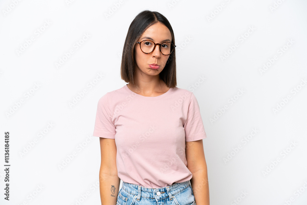 Young caucasian woman isolated on white background with sad expression Young caucasian woman isolated on white background with sad expression