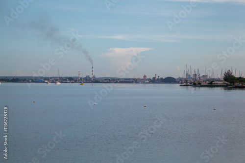 The chimney of Refineria Camilo at bahia de cienfuegos, Cuba photo