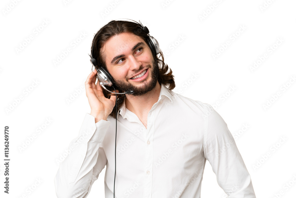 Telemarketer man working with a headset over isolated chroma key background thinking an idea Telemarketer man working with a headset over isolated chroma key background thinking an idea
