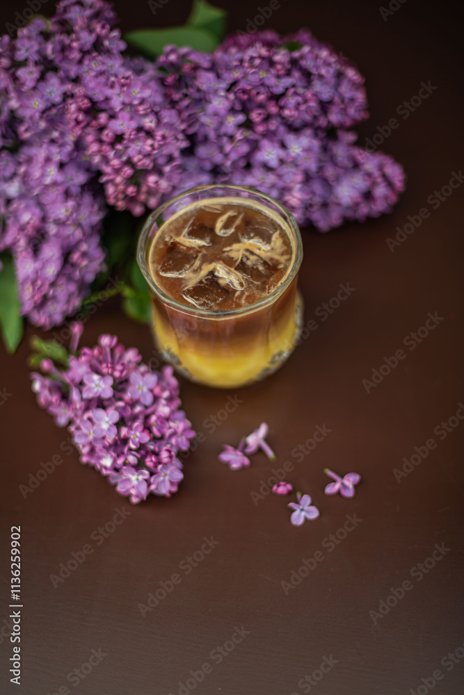 Fototapeta premium A refreshing cold drink on a summer table at a restaurant