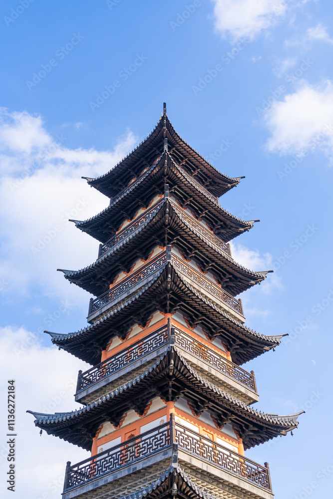 Ancient Chinese pagoda under blue sky and white clouds Ancient Chinese pagoda under blue sky and white clouds