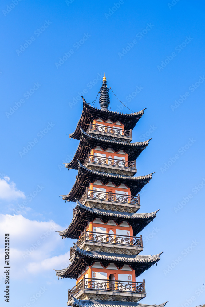 Ancient Chinese pagoda under blue sky and white clouds Ancient Chinese pagoda under blue sky and white clouds