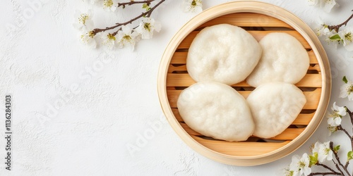 Wallpaper Mural Steamed Bao Buns:  A delicate arrangement of soft, steamed bao buns resting in a bamboo steamer, adorned with delicate cherry blossoms, evokes a sense of serenity and culinary delight.  Torontodigital.ca