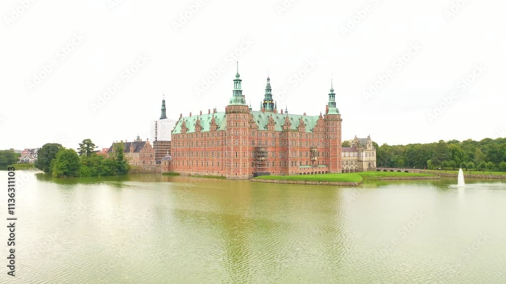 Frederiksborg castle in Denmark - Low Drone shot Frederiksborg castle in Denmark - Low Drone shot
