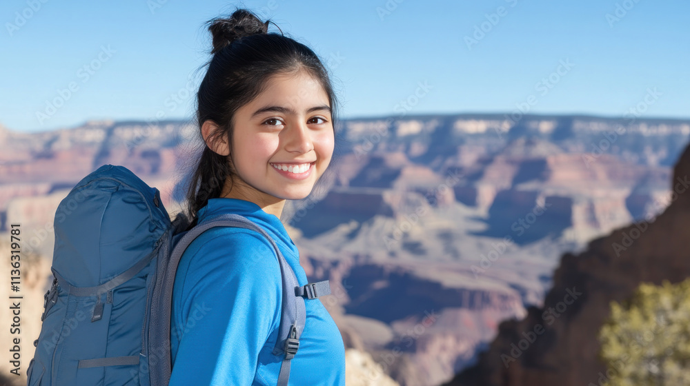 Naklejka premium Canadian girl in blue athleisure doing outdoor activity at grand canyon