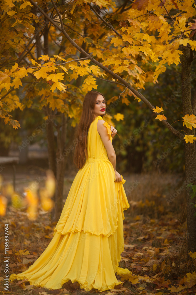 Young princess walking in a beautiful yellow dress.