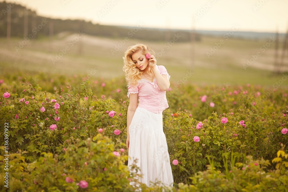 Spring Woman in Rose Field.