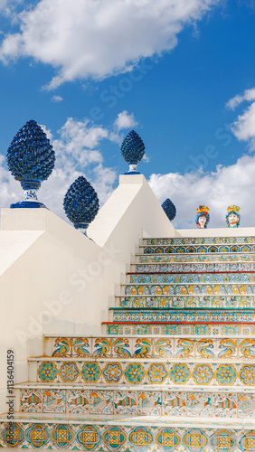 Traditional Sicilian Staircase with Colorful Patterns and Ceramic Tiles. A beautifully decorated staircase in Sicily, featuring vibrant traditional patterns and ceramic tiles.