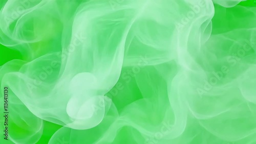 Abstract white smoke swirls on chroma key green screen alpha channel background. Ethereal and dreamy. photo