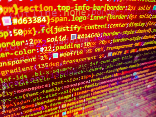 Fragen ?. Programming code on computer screen. Red binary code. Computer code development. Computer technology background. Html with web development. Hacker monitor program. Coded, encryption.