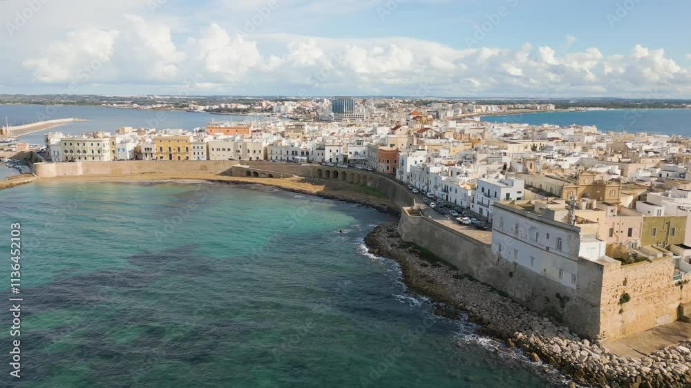 Aerial drone video of the coastal town of Gallipoli in Puglia, southern Italy. Aerial drone video of the coastal town of Gallipoli in Puglia, southern Italy.