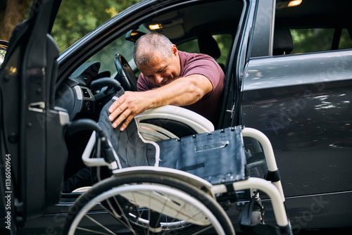 Man in Wheelchair Transitioning into Car