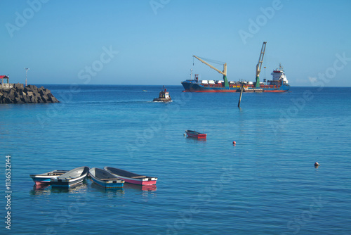 A ship and boats in the Moroni port