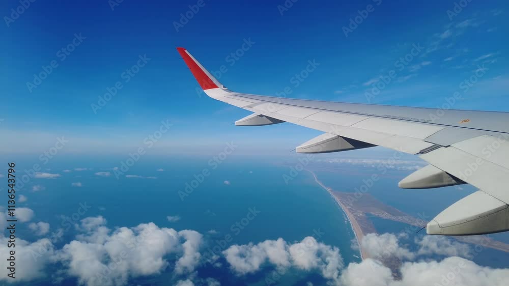 View from airplane flying over sand beach, estuaries and Black sea, Anapa resort, Russia