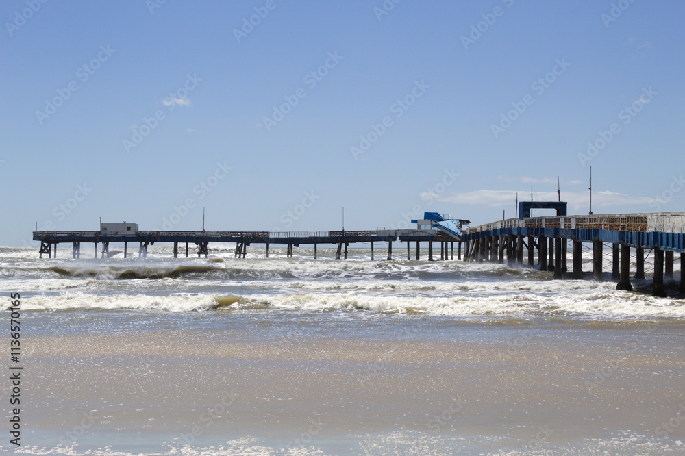 Destroyed fishing platform on Atlantida beach in southern Brazil Destroyed fishing platform on Atlantida beach in southern Brazil