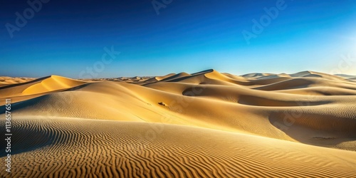 Golden Sand Dunes Under a Vast Blue Sky A Serene Desert Landscape