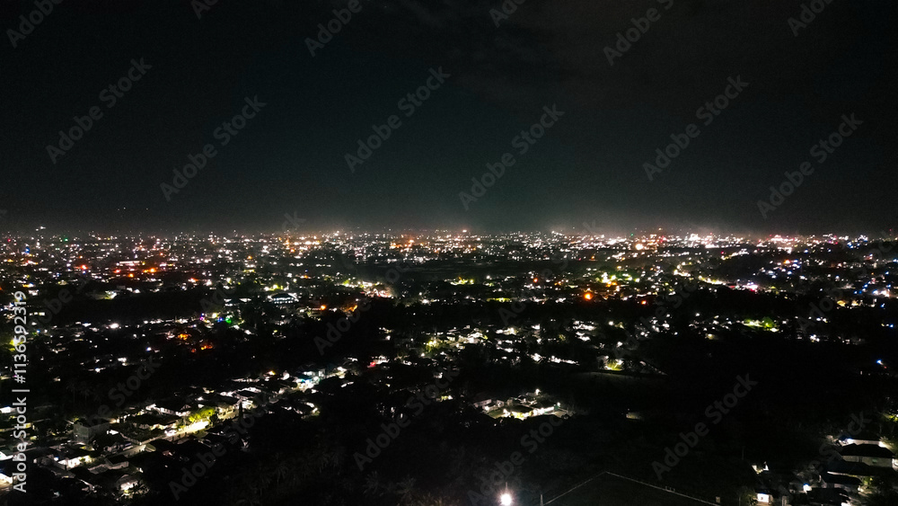 Aerial view of the city at night. View from above. Aerial view of the city at night. View from above.