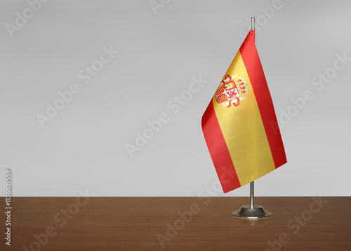 Spain table flag on gray blurred background