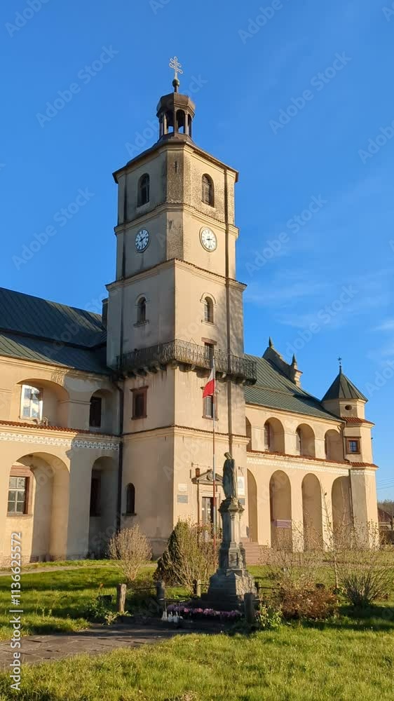 Hourly Bugle Call from Tower of Cistercian Abbey (Opactwo Cystersów). Wąchock, Poland. Hourly Bugle Call from Tower of Cistercian Abbey (Opactwo Cystersów). Wąchock, Poland.