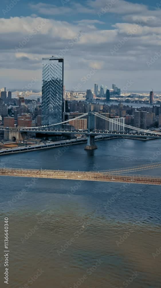 Brooklyn Bridge aerial view showcasing New York skyline and waterways Brooklyn Bridge aerial view showcasing New York skyline and waterways