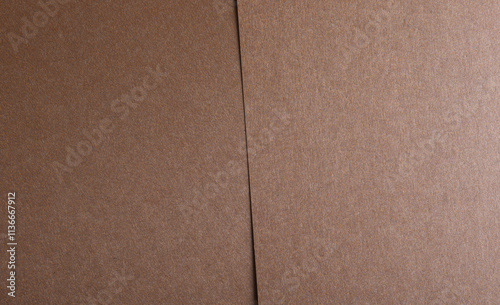 Brown paper background. Smooth and textured surface with a rustic and natural feel, perfect for vintage designs, eco stationery, or wrapping. Minimalist and trendy mocha mousse photo