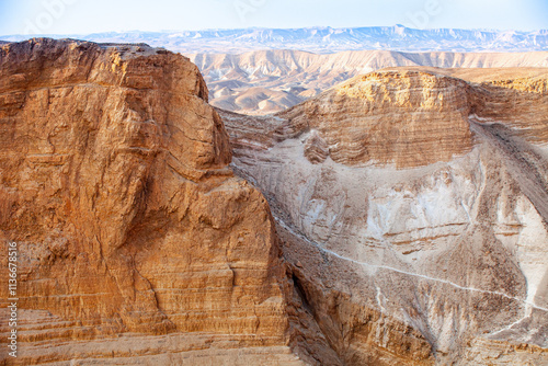 Brown mountains near Masada , Israel. Hot and dry climate destroys mountains constantly and becomes the life in this area so dangerous and sometimes impossible for humans and animals. 