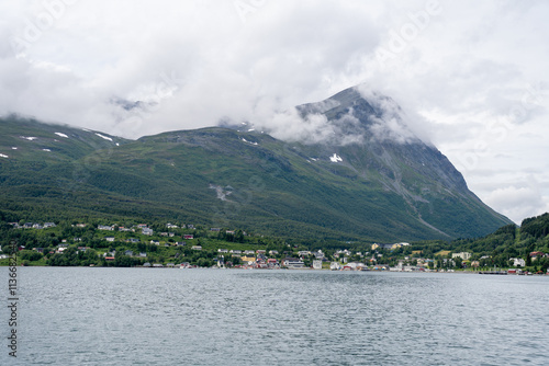 Green mountains, fjord in Norwegian landscape in Lyngseidet, Norway photo