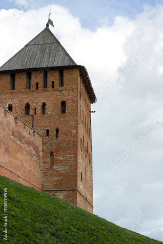 The Kremlin of Veliky Novgorod on a green field