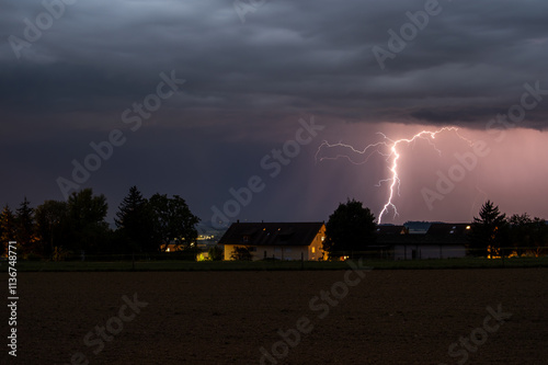 Storm, lightning strike on house.