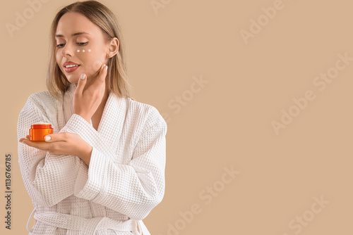 Pretty young woman with fac...