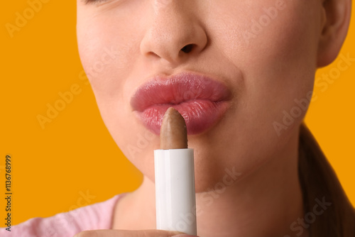 Beautiful young woman apply...