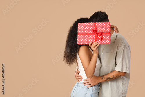 Romantic couple hiding face...