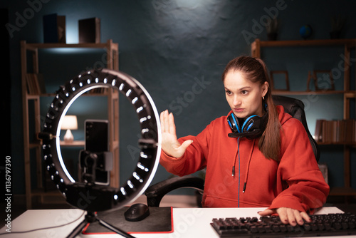 Fotografie Gamer streamer blogger live broadcaster with ring light recording video lesson s