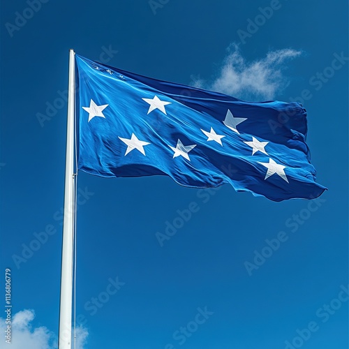 Waving blue flag with white stars against clear sky outdoor scene nature aerial view symbol of unity