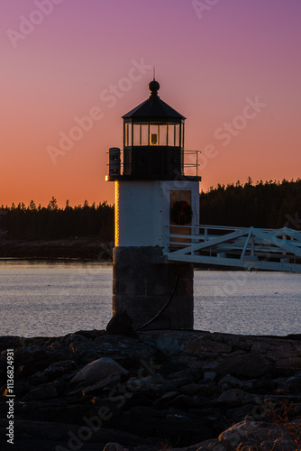 Lighthouse at sunset. Location: Port Clyde, Maine photo