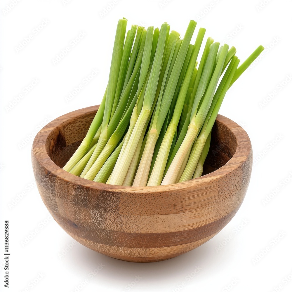A vibrant view of fresh green onions arranged in a smooth wooden bowl, perfect for culinary themes and healthy cooking. A vibrant view of fresh green onions arranged in a smooth wooden bowl, perfect for culinary themes and healthy cooking.