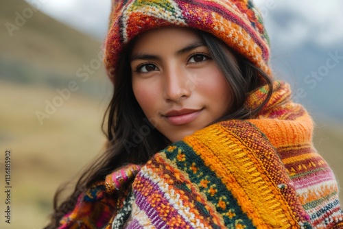 Indigenous quechua woman wearing traditional andean clothing in the mountains