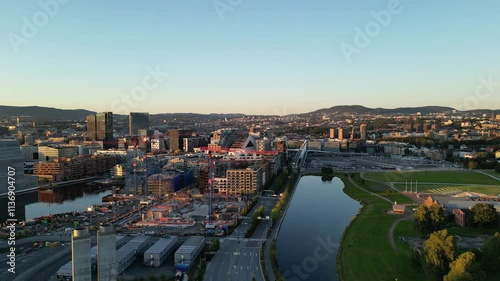 Drone footage over Bjørvika and Sørenga in Oslo on a clear late summer day