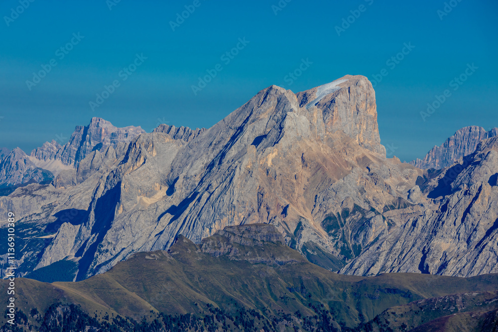 Fototapeta premium Dolomites sunny weather in summer mountains. Green valley and beautiful mountain rocky peaks in the Alps. Alpine scenic landscape in South Tyrol region in Italy