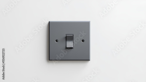 Simple grey modern switch on the white wall used to turn on electrical appliances