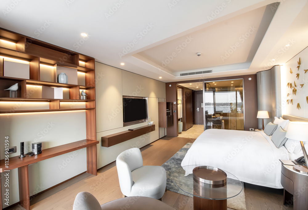 Fototapeta premium Modern hotel room with a bright and airy feel, a luxury hotel room. Example of a hotel room, modern furnishings and architecture.