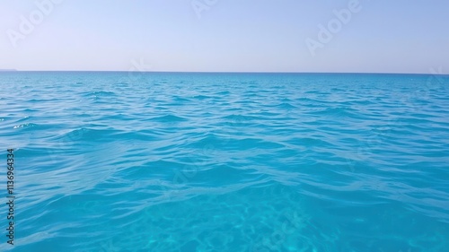 Pure blue turquoise water texture with foam and waves, summer, sea