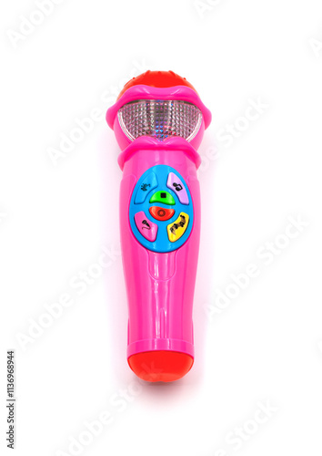 Toy musical microphone on a white background. Children's interactive toy