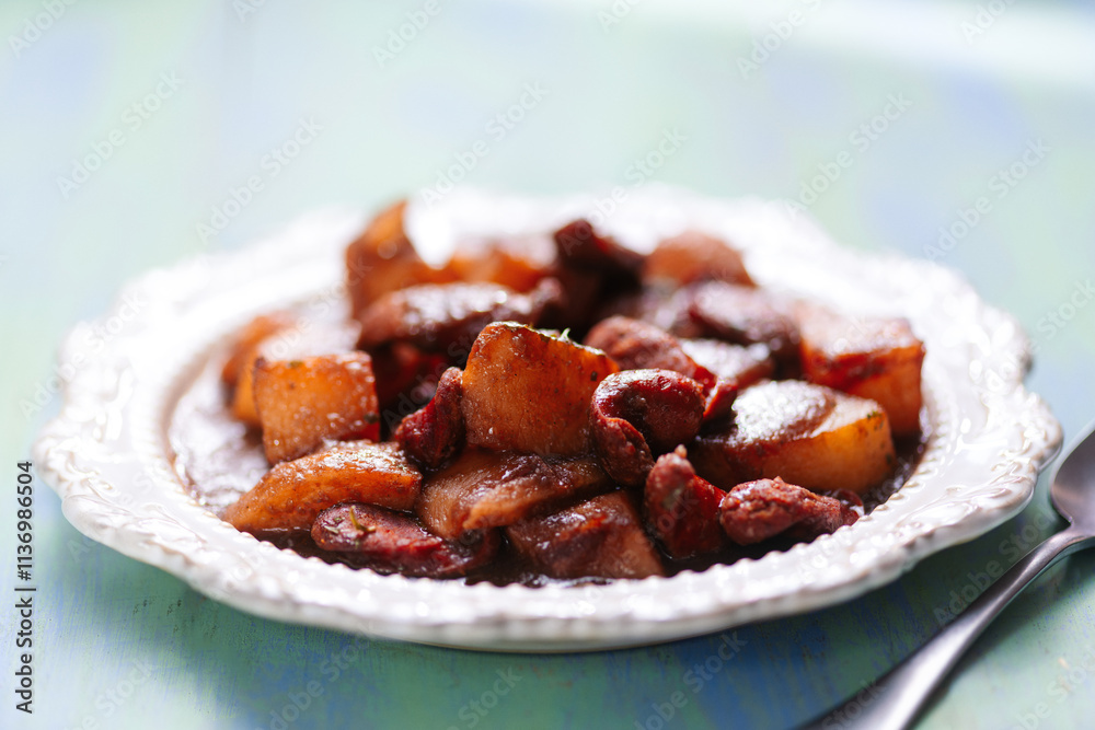 traditional spanish potatoes with chorizo sausage