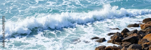 Powerful ocean wave crashing on rocky shore, creating a spray of foamy water, foam, ocean, natural